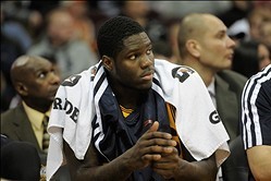 Dec 29, 2013; Cleveland, OH, USA; Cleveland Cavaliers small forward Anthony Bennett sits on the bench during a game against the Golden State Warriors at Quicken Loans Arena. The Warriors won 108-104. Mandatory Credit: David Richard-USA TODAY Sports