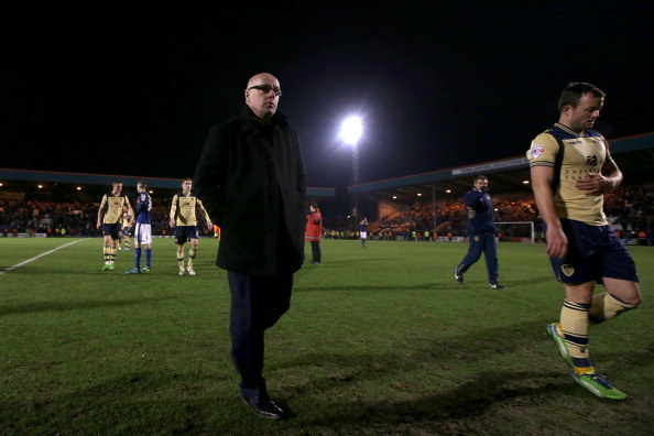 ROCHDALE, ENGLAND - JANUARY 4:  Manager of Leeds United Brian McDermott leaves the field after seeing his team crash out during the Budweiser FA Cup third round match between Rochdale and Leeds United at Spotland Stadium on January 4, 2014 in Rochdale, En