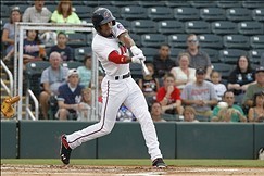 Aug 20, 2013; Ft Myers, FL, USA; Fort Myers Miracle center fielder Byron Buxton (7) singles during the first inning against the Charlotte Stone Crabs at Hammond Stadium. Mandatory Credit: Kim Klement-USA TODAY Sports