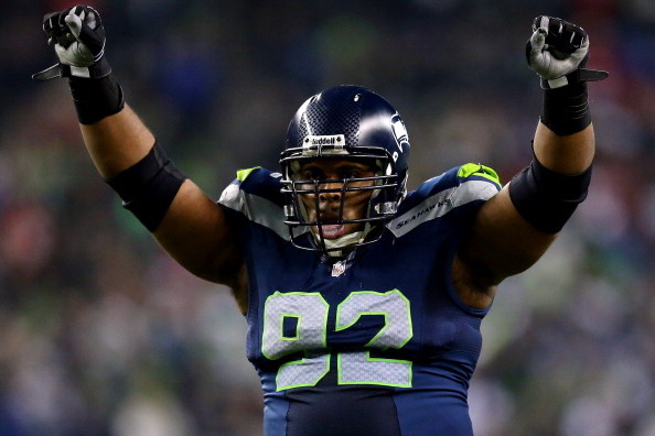 SEATTLE, WA - JANUARY 19:  Defensive tackle Brandon Mebane #92 of the Seattle Seahawks celebrates in the fourth quarter while taking on the San Francisco 49ers during the 2014 NFC Championship at CenturyLink Field on January 19, 2014 in Seattle, Washingto
