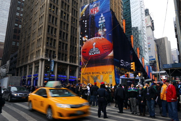 NEW YORK, NY - JANUARY 31:  Fans participate in the festivities on Super Bowl Boulevard in Times Square prior to Super Bowl XLVIII on January 31, 2014 in New York City. Super Bowl XLVIII will be played between the Seattle Seahawks and the Denver Broncos o