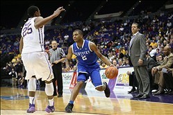 Jan 28, 2014; Baton Rouge, LA, USA; Kentucky Wildcats guard Aaron Harrison (2) is defended by LSU Tigers forward Jordan Mickey (25) in the second half at the Pete Maravich Assembly Center. LSU defeated Kentucky 87-82. Mandatory Credit: Crystal LoGiudice-U