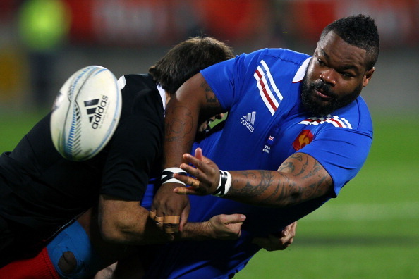 NEW PLYMOUTH, NEW ZEALAND - JUNE 22: Mathieu Bastareaud of France offloads against Conrad Smith of the All Blacks during the Third Test Match between the New Zealand All Blacks and France at Yarrow Stadium on June 22, 2013 in New Plymouth, New Zealand.  (