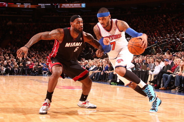 NEW YORK, NY - JANUARY 9: Carmelo Anthony #7 of the New York Knicks drives to the basket against LeBron James #6 of the Miami Heat during a game at Madison Square Garden in New York City on January 9, 2014.  NOTE TO USER: User expressly acknowledges and a