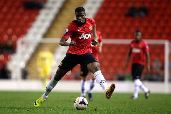 LEIGH, ENGLAND - DECEMBER 02:    Wilfried Zaha of Manchester United U21 controls the ball during the Barclays U21 Premier League match between Blackburn U21 and Manchester United U21 at  Leigh Stadium on December 02, 2013 in Leigh, England.  (Photo by Jan