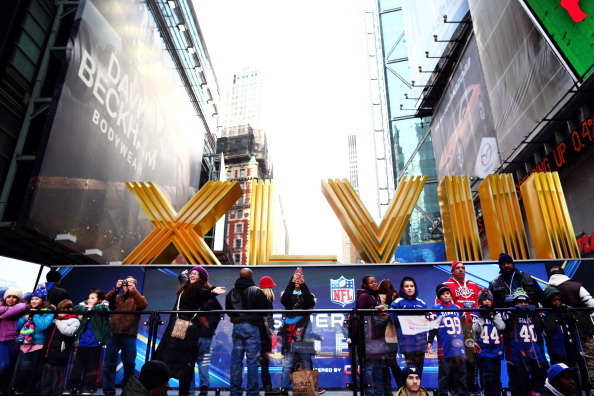 NEW YORK, NY - JANUARY 31:  Fans participate in the festivities on Super Bowl Boulevard in Times Square prior to Super Bowl XLVIII on January 31, 2014 in New York City. Super Bowl XLVIII will be played between the Seattle Seahawks and the Denver Broncos o