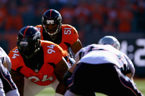 DENVER, CO - JANUARY 19:   Paris Lenon #51 of the Denver Broncos looks on against the New England Patriots during the AFC Championship game at Sports Authority Field at Mile High on January 19, 2014 in Denver, Colorado.  (Photo by Doug Pensinger/Getty Ima