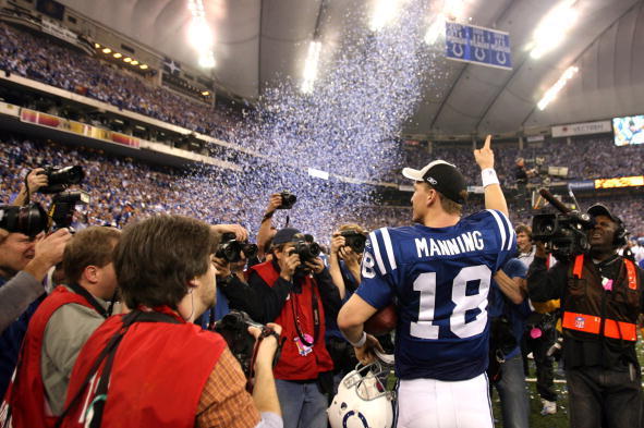 Peyton Manning of the Indianapolis Colts celebrates after the AFC Championship game between the New England Patriots and Indianapolis Colts at the RCA Dome in Indianapolis, Indiana on January 21, 2007. The Colts defeated the Patriots 38 - 34. (Photo by Mi
