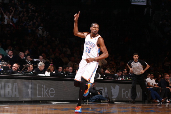 NEW YORK, NY - JANUARY 31: Kevin Durant #35 of the Oklahoma City Thunder celebrates against the Brooklyn Nets at the Barclays Center on January 31, 2014 in the Brooklyn borough of New York City.  NOTE TO USER: User expressly acknowledges and agrees that, 