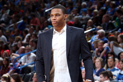 OKLAHOMA CITY, OK - JANUARY 19:  Russell Westbrook #0 of the Oklahoma City Thunder looks on during an NBA game on January 19, 2014 at the Chesapeake Energy Arena in Oklahoma City, Oklahoma. NOTE TO USER: User expressly acknowledges and agrees that, by dow