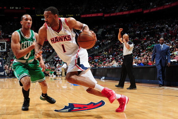 ATLANTA, GA - APRIL 29:  Tracy McGrady #1 of the Atlanta Hawks drives to the basket against Avery Bradley #0 of the Boston Celtics in Game One of the Eastern Conference Quarterfinals during the 2012 NBA Playoffs on April 29, 2012 at the Philips Arena in A