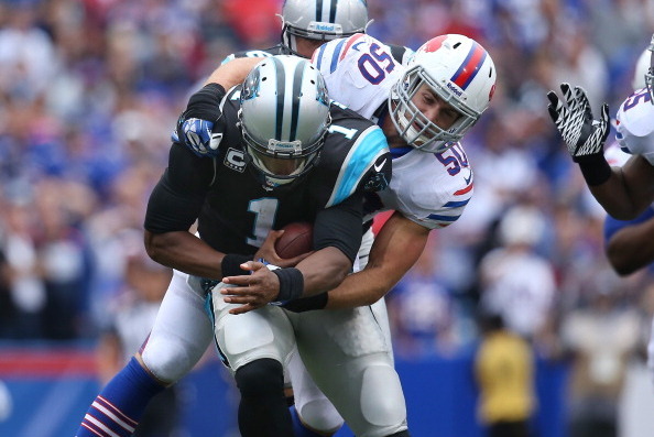 ORCHARD PARK, NY - SEPTEMBER 15: Cam Newton #1 of the Carolina Panthers is sacked to end the game during NFL game action by Kiko Alonso #50 of the Buffalo Bills at Ralph Wilson Stadium on September 15, 2013 in Orchard Park, New York. (Photo by Tom Szczerb