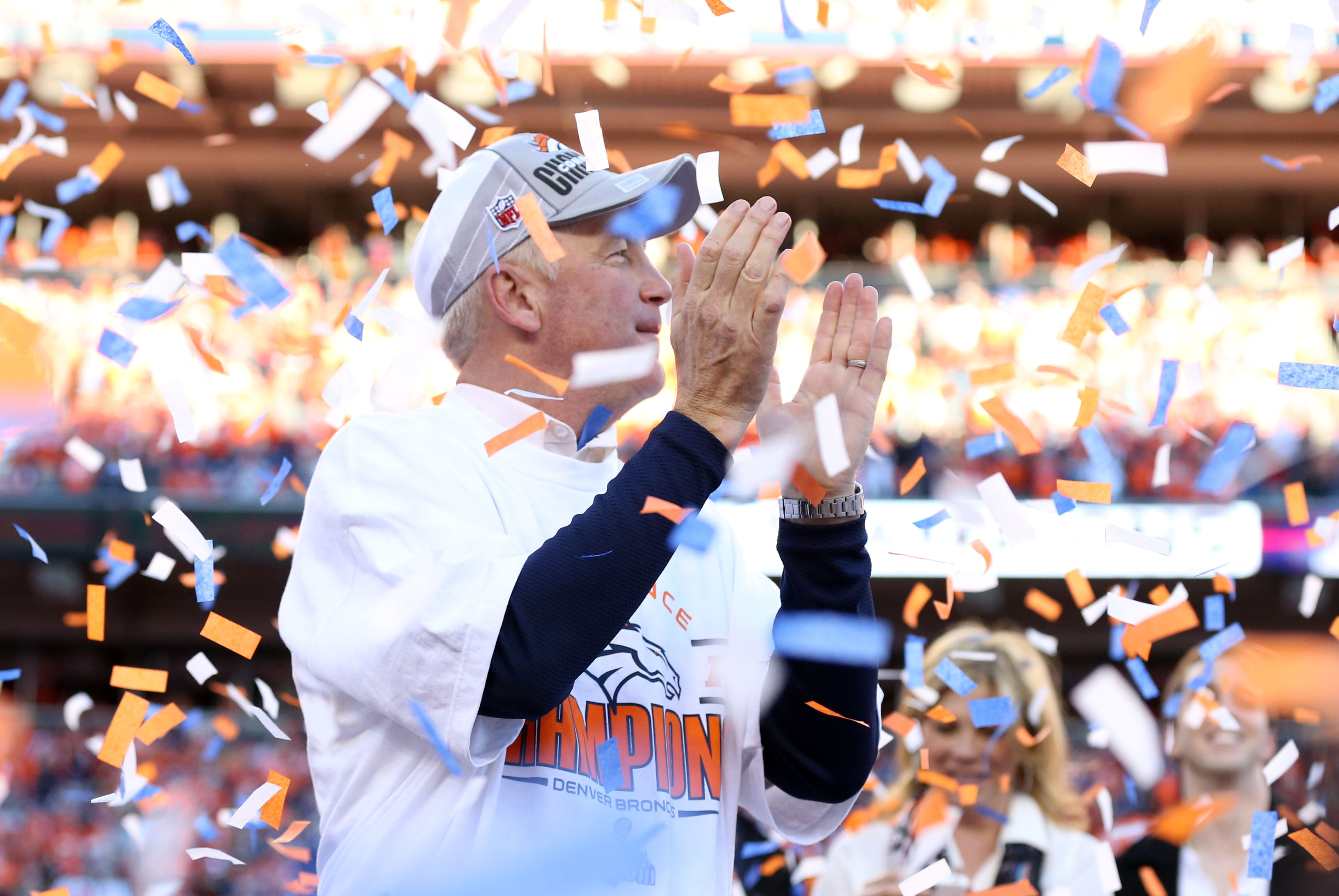 Jan 19, 2014; Denver, CO, USA; Denver Broncos head coach John Fox celebrates after the 2013 AFC Championship game as confetti falls at Sports Authority Field against the New England Patriots at Mile High. Mandatory Credit: Matthew Emmons-USA TODAY Sports