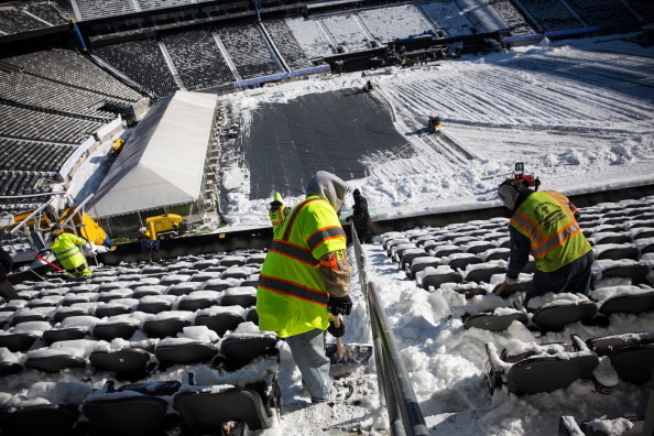 EAST RUTHERFORD, NJ - JANUARY 22:  Crews work to remove snow from MetLife Stadium, which will host Superbowl XLVIII next month, on January 22, 2014 in East Rutherford, New Jersey. In what is being called the first ever 'cold weather superbowl,' the Denver