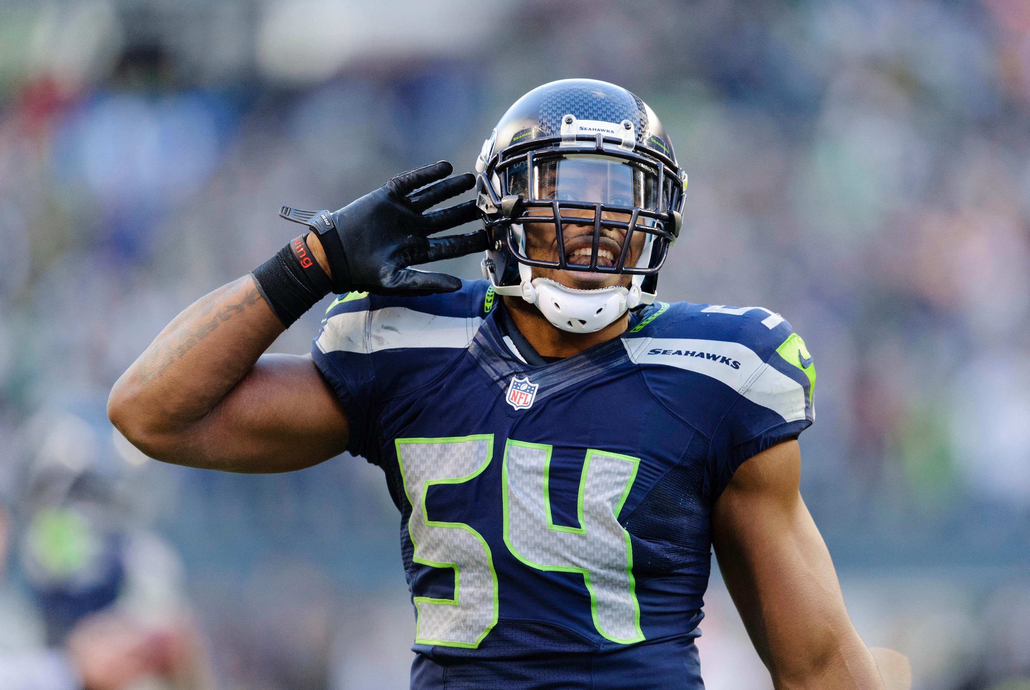 Nov 3, 2013; Seattle, WA, USA; Seattle Seahawks middle linebacker Bobby Wagner (54) celebrates after recording a sack against the Tampa Bay Buccaneers during the game at CenturyLink Field. Seattle defeated Tampa Bay 27-24. Mandatory Credit: Steven Bisig-U