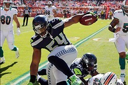 NOV 25, 2012; Miami, FL, USA;  Seattle Seahawks middle linebacker Bobby Wagner (54) runs with the ball after an interception of Miami Dolphins quarterback Ryan Tannehill (not pictured) in the first quarter at Sun Life Stadium. Mandatory Credit: Robert May