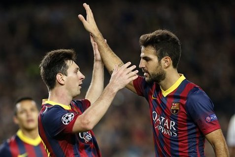 Cesc Fabregas (right) is delighted to have Messi back in action
