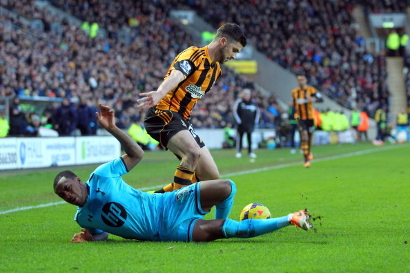 HULL, ENGLAND - FEBRUARY 01: Shane Long of Hull City vies with Danny Rose of Tottenham Hotspur during the Barclays Premier League match between Hull City and Tottenham Hotspur at KC Stadium on February 01, 2014 in Hull, England.  (Photo by Tim Keeton/Gett