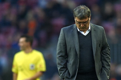 BARCELONA, SPAIN - FEBRUARY 01:  Head coach Gerardo Martino of FC Barcelona reacts during the La Liga match between FC Barcelona and Valencia CF at Camp Nou on February 1, 2014 in Barcelona, Spain.  (Photo by Manuel Queimadelos Alonso/Getty Images)