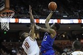 Feb 1, 2014; Austin, TX, USA; Kansas Jayhawks guard Andrew Wiggins (22) shoots against Texas Longhorns forward Jonathan Holmes (10) during the first half at the Frank Erwin Special Events Center. Mandatory Credit: Brendan Maloney-USA TODAY Sports