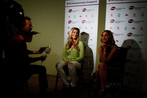 SINGAPORE - JANUARY 27:  Eugenie Bouchard and Chris Evert are being interview by local press after the press conference January 27, 2014 in Singapore.  (Photo by Rahman Roslan/Getty Images for WTA)