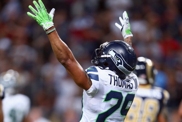 ST LOUIS, MO - OCTOBER 28: Earl Thomas #29 of the Seattle Seahawks celebrates after the 14-9 victory over the the St. Louis Rams at Edward Jones Dome on October 28, 2013 in St Louis, Missouri.  (Photo by Andy Lyons/Getty Images)