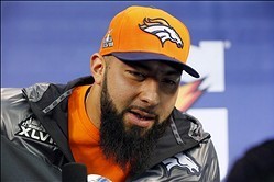 Jan 28, 2014; Newark, NJ, USA; Denver Broncos guard Louis Vasquez speaks to the media during Media Day for Super Bowl XLVIII at Prudential Center. Mandatory Credit: Adam Hunger-USA TODAY Sports