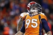 Nov 17, 2013; Denver, CO, USA; Denver Broncos defensive end Derek Wolfe (95) reacts after a play in the third quarter against the Kansas City Chiefs at Sports Authority Field at Mile High. The Broncos won 27-17. Mandatory Credit: Isaiah J. Downing-USA TOD