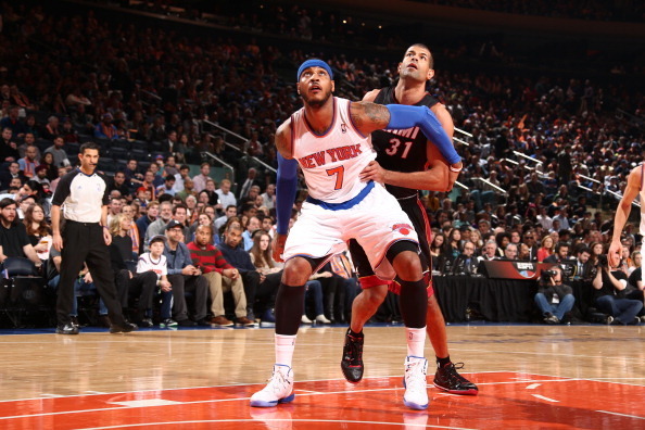NEW YORK, NY - FEBRUARY 01: Carmelo Anthony #7 of the New York Knicks prepares to rebound against Shane Battier #31 of the Miami Heat during a game at Madison Square Garden in New York City on February 01, 2014.  NOTE TO USER: User expressly acknowledges 