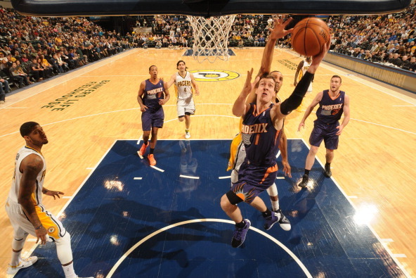INDIANAPOLIS - JANUARY 30: Goran Dragic #1 of the Phoenix Suns putting up a layup during a game against the Indiana Pacers at Bankers Life Fieldhouse on January 30, 2014 in Indianapolis, Indiana.  NOTE TO USER: User expressly acknowledges and agrees that,