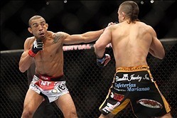 Feb 1, 2014; Newark, NJ, USA; Jose Aldo (red gloves) fights Ricardo Lamas (blue gloves) during UFC 169 at Prudential Center. Mandatory Credit: Joe Camporeale-USA TODAY Sports