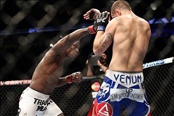 Feb 1, 2014; Newark, NJ, USA; Clint Hester (red gloves) fights Andy Enz (blue gloves) during UFC 169 at Prudential Center. Mandatory Credit: Joe Camporeale-USA TODAY Sports