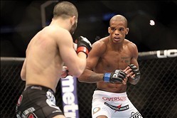 Feb 1, 2014; Newark, NJ, USA; John Makdessi (red gloves) fights Alan Patrick (blue gloves) during UFC 169 at Prudential Center. Mandatory Credit: Joe Camporeale-USA TODAY Sports