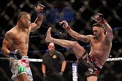 Feb 1, 2014; Newark, NJ, USA; Jamie Varner (red gloves) fights Abel Trujillo (blue gloves) during UFC 169 at Prudential Center. Mandatory Credit: Joe Camporeale-USA TODAY Sports