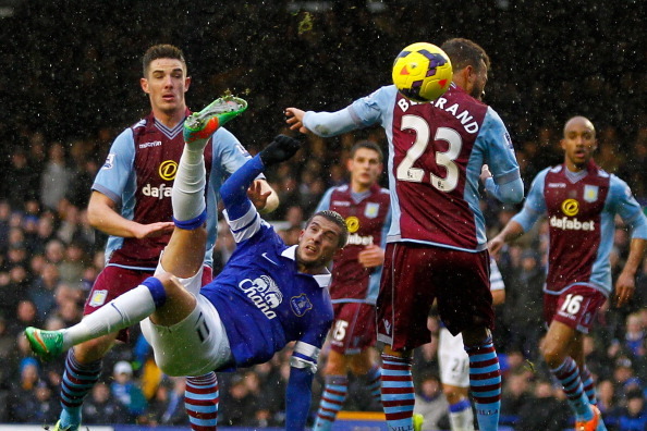 LIVERPOOL, ENGLAND - FEBRUARY 01: (EDITORS NOTE: Retransmission of #466341733 with alternate crop.) Kevin Mirallas (C) of Everton shoots at goal during the Barclays Premier League match between Everton and Aston Villa at Goodison Park on February 1, 2014 