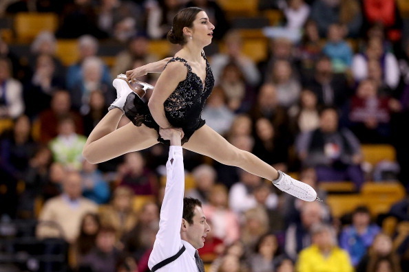 BOSTON, MA - JANUARY 11:  Marissa Castelli and Simon Shnapir skate in the pairs free skate during the Prudential U.S. Figure Skating Championships at TD Garden on January 11, 2014 in Boston, Massachusetts.  (Photo by Matthew Stockman/Getty Images)