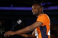 Jan 29, 2014; Jersey City, NJ, USA; Denver Broncos cornerback Champ Bailey (24) during a press conference for Super Bowl XLVIII  at Hyatt Regency. Mandatory Credit: Noah K. Murray-USA TODAY Sports