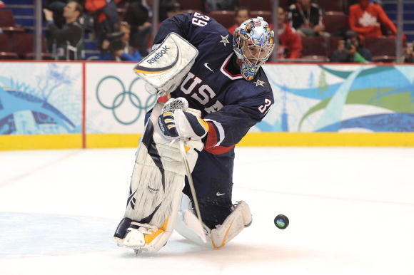 VANCOUVER, BC - FEBRUARY 26:  Goalkeeper Ryan Miller #39 of the United States looks at the puck during the ice hockey men's semifinal game between the United States and Finland on day 15 of the Vancouver 2010 Winter Olympics at Canada Hockey Place on Febr