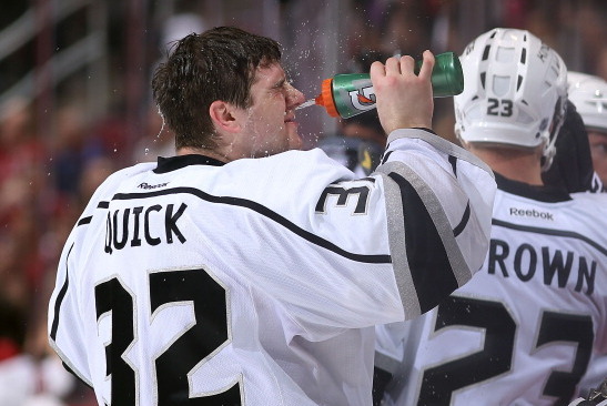 GLENDALE, AZ - JANUARY 28:  Goaltender Jonathan Quick #32 of the Los Angeles Kings sprays water in his face during a break from the NHL game against the Phoenix Coyotes at Jobing.com Arena on January 29, 2014 in Glendale, Arizona.  The Coyotes defeated th