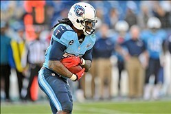 Dec 29, 2013; Nashville, TN, USA; Tennessee Titans running back Chris Johnson (28) carries the ball against the Houston Texans during the second half at LP Field. Tennessee won 16-10. Mandatory Credit: Jim Brown-USA TODAY Sports