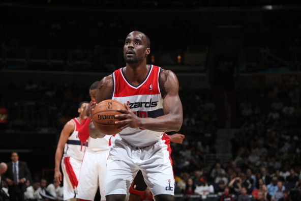 WASHINGTON, DC - APRIL 10:  Emeka Okafor #50 of the Washington Wizards attempts a foul shot against the Miami Heat at the Verizon Center on April 10, 2013 in Washington, DC. NOTE TO USER: User expressly acknowledges and agrees that, by downloading and or 
