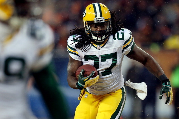 CHICAGO, IL - DECEMBER 29: Running back Eddie Lacy #27 of the Green Bay Packers carries the ball against the Chicago Bears during a game at Soldier Field on December 29, 2013 in Chicago, Illinois.  (Photo by Jonathan Daniel/Getty Images)