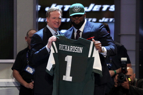 NEW YORK, NY - APRIL 25:  Sheldon Richardson of the Missouri Tigers stands with NFL Commissioner Roger Goodell (L) as they hold up a jersey on stage after Richardson was picked #13 overall by the New York Jets in the first round of the 2013 NFL Draft at R
