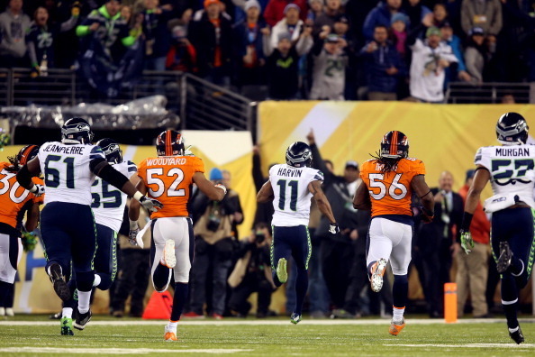 EAST RUTHERFORD, NJ - FEBRUARY 02:  Wide receiver Percy Harvin #11 of the Seattle Seahawks runs 87-yards to score a touchdown against the Denver Broncos in the third quarter during Super Bowl XLVIII at MetLife Stadium on February 2, 2014 in East Rutherfor