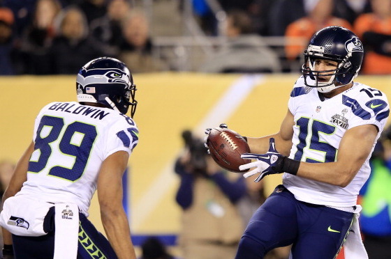 EAST RUTHERFORD, NJ - FEBRUARY 02:  Wide receiver Jermaine Kearse #15 of the Seattle Seahawks scores a 23 yard touchdown during Super Bowl XLVIII against the Denver Broncos at MetLife Stadium on February 2, 2014 in East Rutherford, New Jersey.  (Photo by 