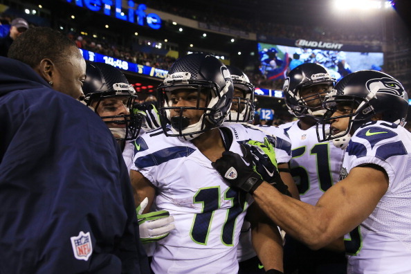 EAST RUTHERFORD, NJ - FEBRUARY 02: Wide receiver Percy Harvin #11 of the Seattle Seahawks celebrates his 2nd half kickoff return during the third quarter of Super Bowl XLVIII at MetLife Stadium on February 2, 2014 in East Rutherford, New Jersey.  (Photo b