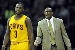 Nov 30, 2013; Cleveland, OH, USA; Cleveland Cavaliers shooting guard Dion Waiters (3) walks back to the floor after talking to head coach Mike Brown in the first quarter against the Chicago Bulls at Quicken Loans Arena. Mandatory Credit: David Richard-USA