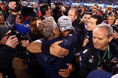 Feb 2, 2014; East Rutherford, NJ, USA; Seattle Seahawks head coach Pete Carroll (left) celebrates with quarterback Russell Wilson after Super Bowl XLVIII against the Denver Broncos at MetLife Stadium.  Mandatory Credit: Mark J. Rebilas-USA TODAY Sports