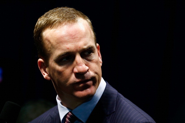 EAST RUTHERFORD, NJ - FEBRUARY 02:  Quarterback Peyton Manning #18 of the Denver Broncos speaks to press after Super Bowl XLVIII at MetLife Stadium on February 2, 2014 in East Rutherford, New Jersey. The Seahawks beat the Broncos 43-8.  (Photo by Jeff Zel