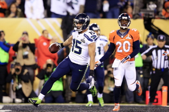 EAST RUTHERFORD, NJ - FEBRUARY 02:  Wide receiver Jermaine Kearse #15 of the Seattle Seahawks scores a 23 yard touchdown during Super Bowl XLVIII against the Denver Broncos at MetLife Stadium on February 2, 2014 in East Rutherford, New Jersey.  (Photo by 